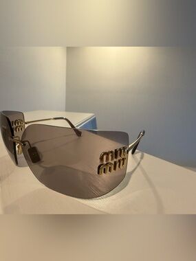 Miu Miu Gold-Accented Pink Gradient Rimless Shield Sunglasses